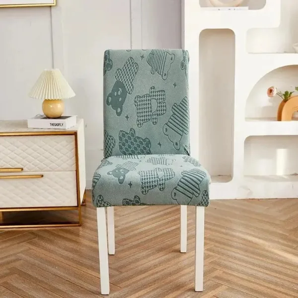 Stoelhoes jacquard met geweven dessin, blauwgroen, op eettafelstoel.